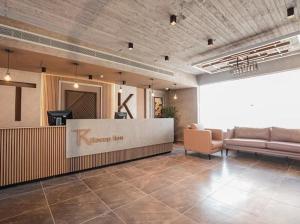 a lobby with a reception desk in a building at TK Suites in Hurghada