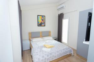 Katil atau katil-katil dalam bilik di Hotel Autochthonous