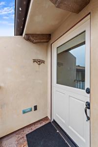 a garage door with a basketball hoop at Villa D'Arte at the Retreat in Laguna Beach in Laguna Beach