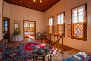 A bed or beds in a room at Meymune Valide Konağı