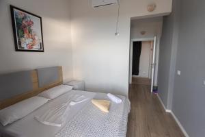Katil atau katil-katil dalam bilik di Hotel Autochthonous
