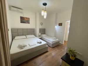 Postel nebo postele na pokoji v ubytování Arteg Apartments - Premium
