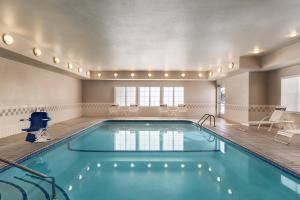 a swimming pool in a hotel room with a pool at Residence Inn El Paso in El Paso