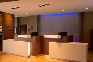 a lobby with a waiting room with a counter top at Fairfield Inn & Suites by Marriott Durango in Durango