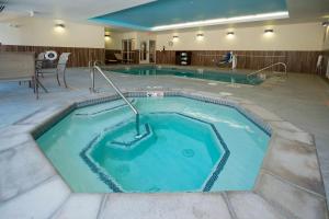 a jacuzzi tub in the middle of a pool at Fairfield Inn & Suites by Marriott Durango in Durango