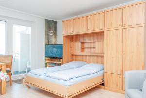 Postel nebo postele na pokoji v ubytování Haus Hanseatic, Wohnung 603