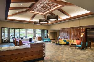 a lobby of a hotel with colorful furniture at Residence Inn by Marriott Maui Wailea in Wailea