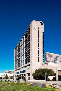 a large white building with a clock on it at The Westin Galleria Dallas in Dallas