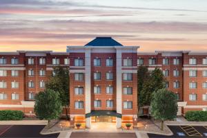 an artist rendering of the front of a building at Residence Inn by Marriott Chicago Oak Brook in Oak Brook