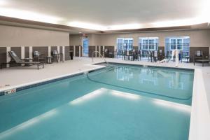 a large swimming pool in a hotel room at Residence Inn Boston Westford in Westford
