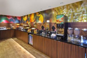 a buffet line in a restaurant with food on display at Fairfield Inn Ann Arbor in Ann Arbor