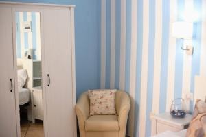 A seating area at Superior Apartment le Case del Sole Licata