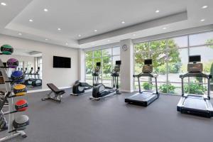 a gym with a lot of treadmills and machines at TownePlace Suites by Marriott Columbus Dublin in Dublin