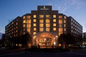 a building with a sign on the top of it at Renaissance Charlotte SouthPark Hotel in Charlotte