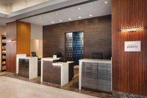 a lobby with a desk with a computer on it at Residence Inn Bethesda Downtown in Bethesda