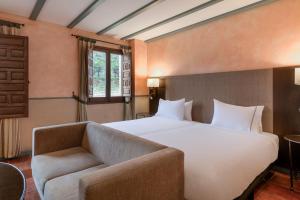Postel nebo postele na pokoji v ubytování AC Hotel Ciudad de Toledo by Marriott + 37 fotografií