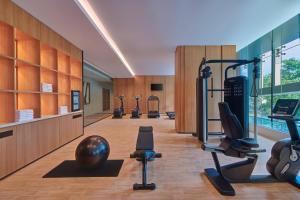 a gym with treadmills and exercise equipment at Fairfield by Marriott Kuala Lumpur Jalan Pahang in Kuala Lumpur