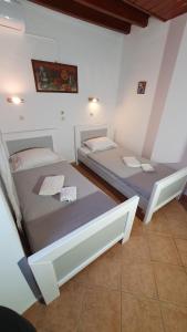 Postel nebo postele na pokoji v ubytování ASTORIA lindos