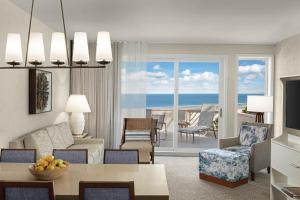 a living room with a view of the ocean at Marriott's Monarch at Sea Pines in Hilton Head Island