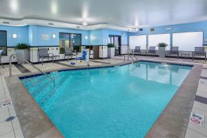 a large swimming pool in a hotel room at Fairfield Inn & Suites Kodak in Kodak