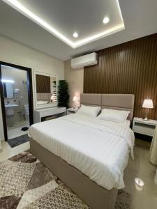 A bed or beds in a room at MJ Private APARTMENT