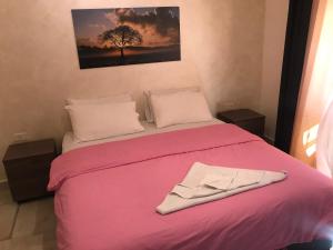 Postel nebo postele na pokoji v ubytování Suzan Hotel Apartments