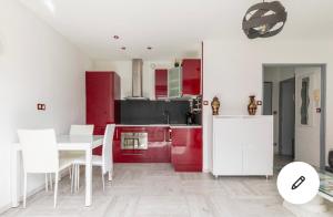 Kuchyňa alebo kuchynka v ubytovaní Superbe Appartement t3 avec piscine