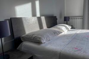 Ένα ή περισσότερα κρεβάτια σε δωμάτιο στο Luxury Home Cabras Centro