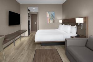 Uma TV ou centro de entretenimento em AC Hotel by Marriott Columbus Downtown