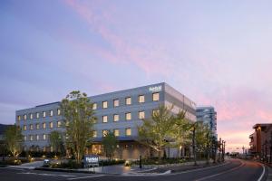 a rendering of a building on a street at Fairfield by Marriott Hyogo Awaji Fukura in Minamiawaji