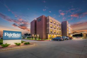 a hotel with cars parked in a parking lot at Fairfield Inn & Suites by Marriott Chickasha in Chickasha