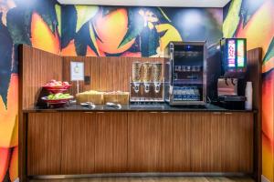 a counter in a restaurant with a colorful wall at Fairfield Inn & Suites by Marriott Chickasha in Chickasha