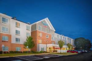 a rendering of a hotel with a parking lot at TownePlace Suites by Marriott Providence North Kingstown in North Kingstown