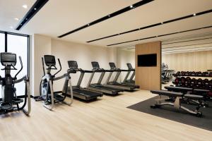 a gym with treadmills and elliptical machines at Fairfield by Marriott Osaka Namba in Osaka
