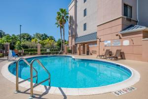 a swimming pool in front of a building at Fairfield Inn and Suites Holiday Tarpon Springs in Holiday