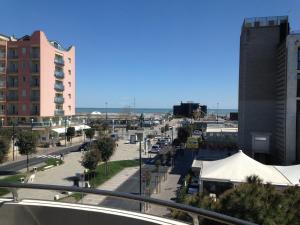 a view of a street in a city with buildings at Residenza Roma Marina in Sottomarina