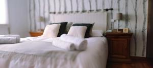 A bed or beds in a room at Casa Angela