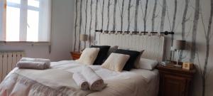 A bed or beds in a room at Casa Angela