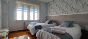 A bed or beds in a room at Casa Angela