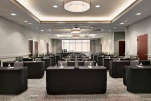 a large room with rows of tables and chairs at Courtyard by Marriott Tysons McLean in Tysons Corner