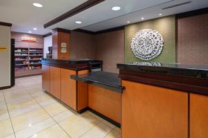 a lobby with a counter in a store at Fairfield Inn & Suites Seattle Bremerton in Bremerton