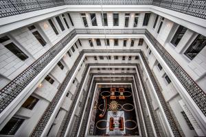 a view from the floor of a building with a chandelier at Prestige Hotel Budapest in Budapest
