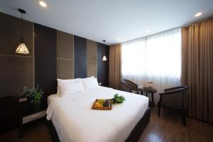 Katil atau katil-katil dalam bilik di Keypad Hotel - 24 Hang Ga
