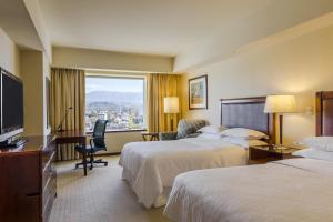 Cama ou camas em um quarto em Sheraton Mendoza Hotel