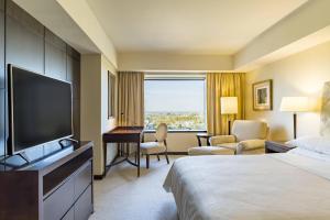 Uma TV ou centro de entretenimento em Sheraton Mendoza Hotel