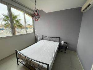 Posteľ alebo postele v izbe v ubytovaní T3 moderne, piscine, clim, parking au Cap d'Agde - FR-1-723-55 + 6 fotografií