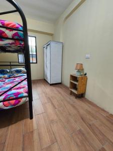 Ein Etagenbett oder Etagenbetten in einem Zimmer der Unterkunft Casa completa en apaneca El salvador