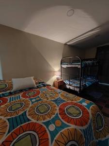 Ein Bett oder Betten in einem Zimmer der Unterkunft Casa completa en apaneca El salvador