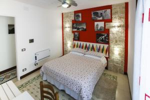 A bed or beds in a room at Antico Borgo