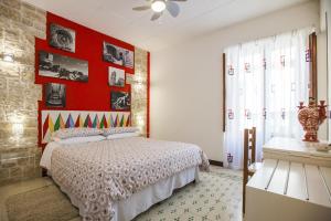 A bed or beds in a room at Antico Borgo